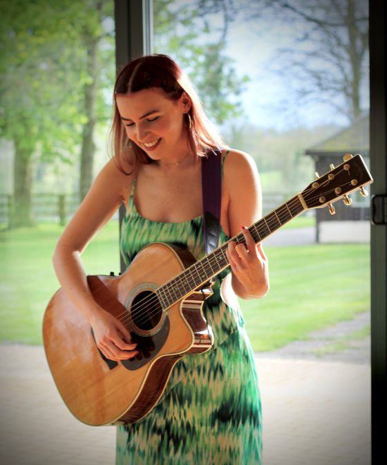 female singer guitarist