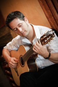 Guitarist Tom on Stage